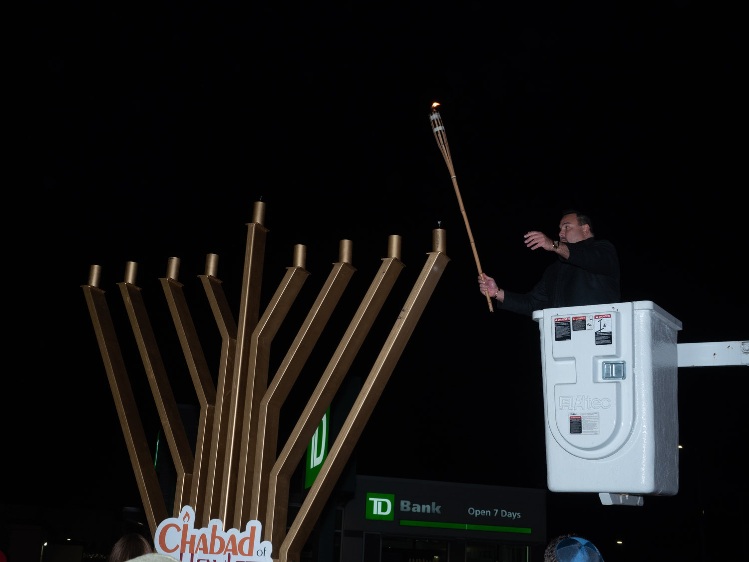 The Hewlett-Woodmere Business Association hosted its annual Hanukkah celebration lighting on Sunday, the first night of the eight-day Jewish holiday. Steve Bouskila lit the menorah.