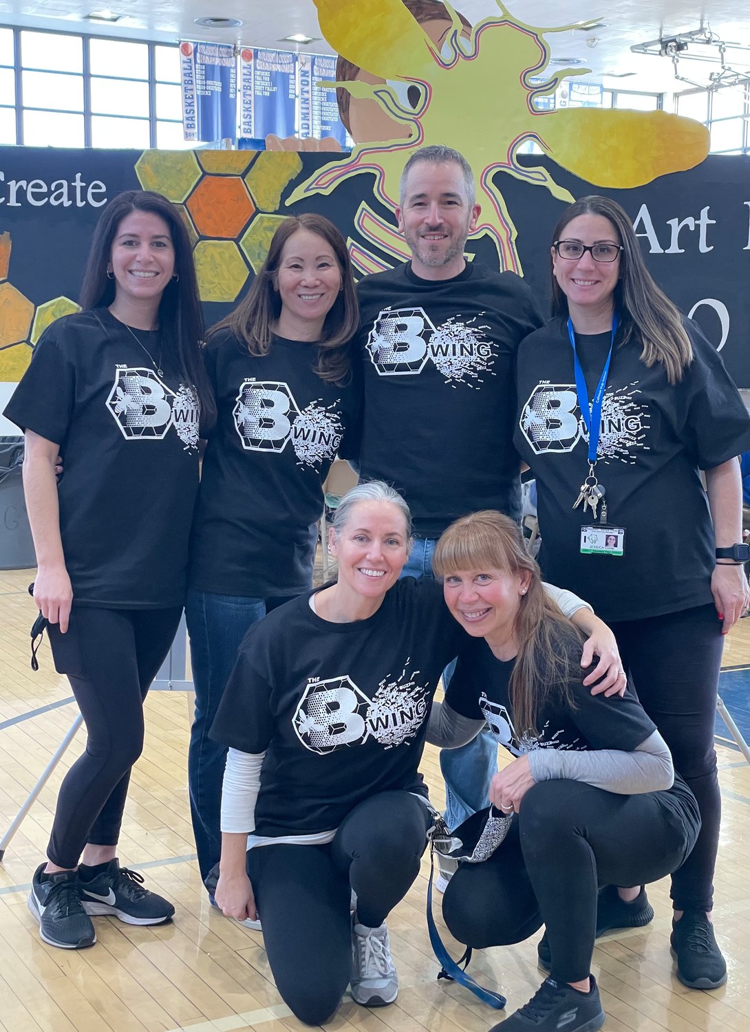 Calhoun art teachers Heather Lohr, Linda Seckler, Michael Goldberg and Jessica Conte, top, and Nancy Scott and Joan Gonzalez, bottom, helped students produce the dozens of projects on display in Calhoun’s gym.
