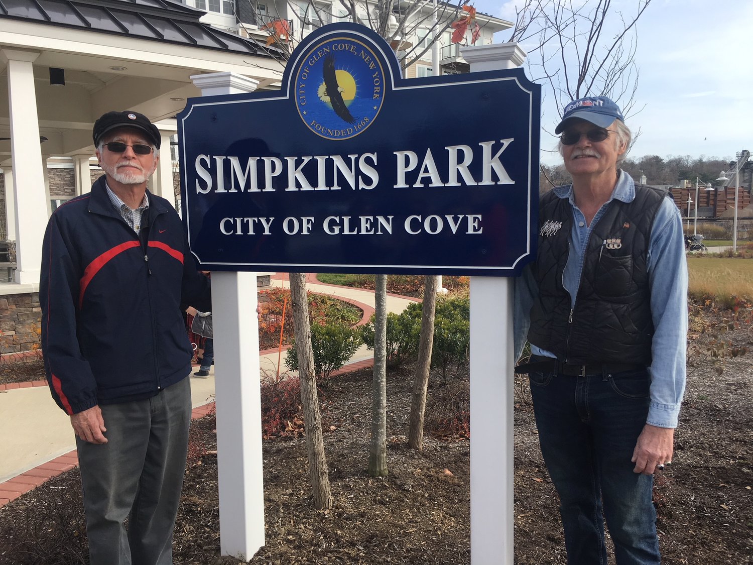 Herb and Dave Schierhorst, of Glen Cove and Sea Cliff, respectively, are descendants of Nicholas Simkins, whose name will be corrected on the sign that was unveiled on Dec. 16.