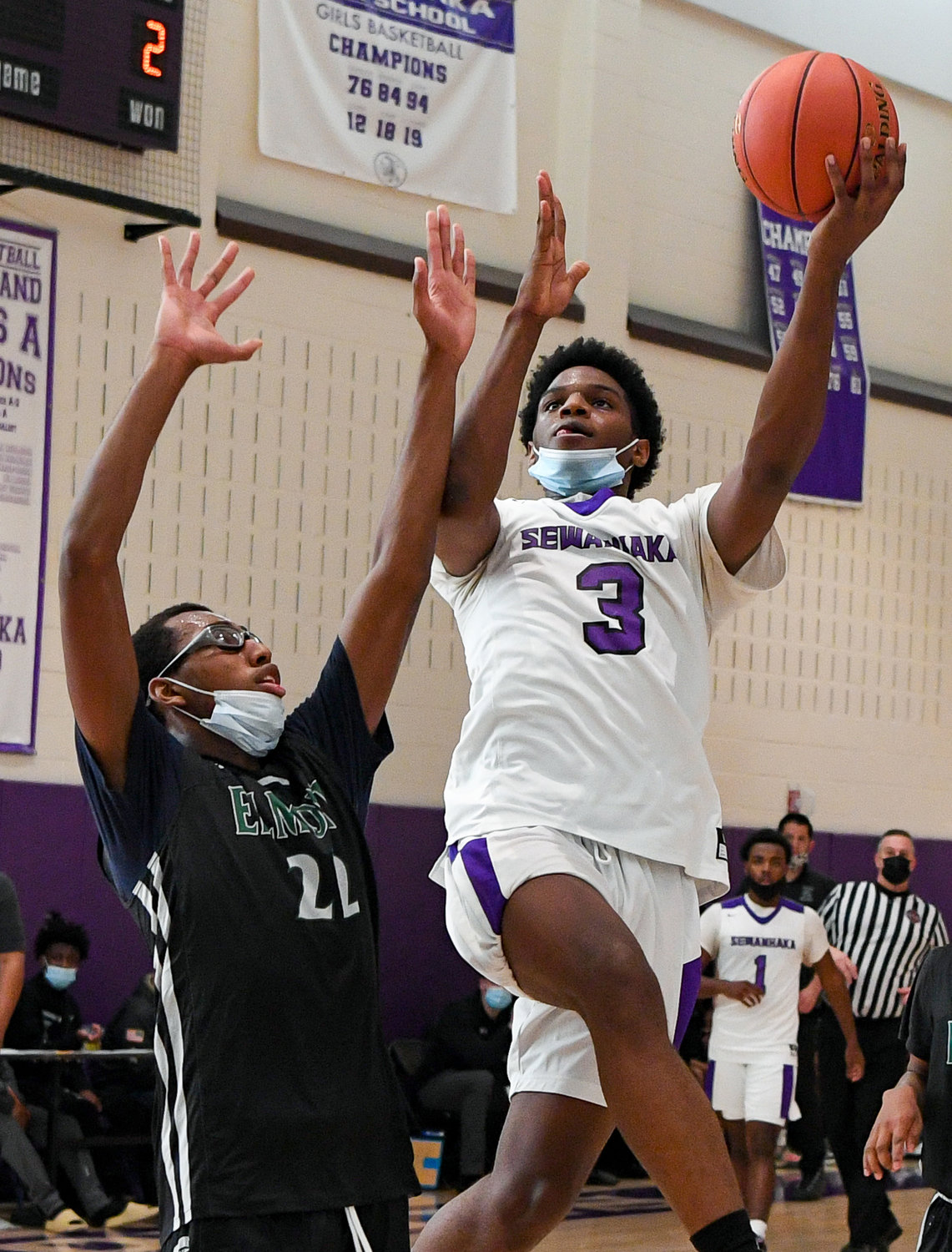 Senior J'Den Lloyd, right, went off for 28 points and 14 rebounds last Saturday as Sewanhaka cruised past visiting Elmont by 26.