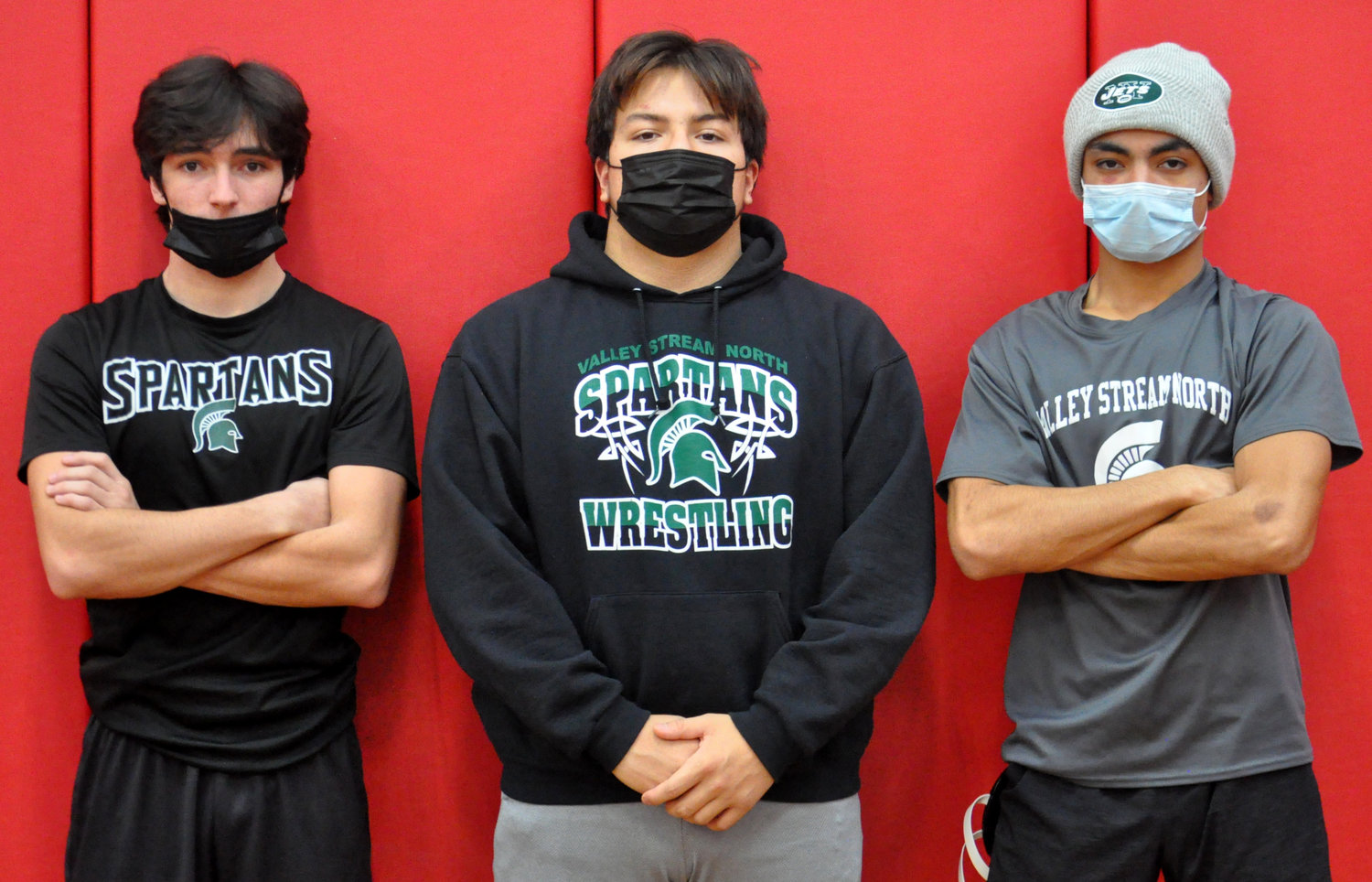 From left, Thomas Santo, Joshua Lopez and Michael Munson are leading Valley Stream North's efforts on the mat.