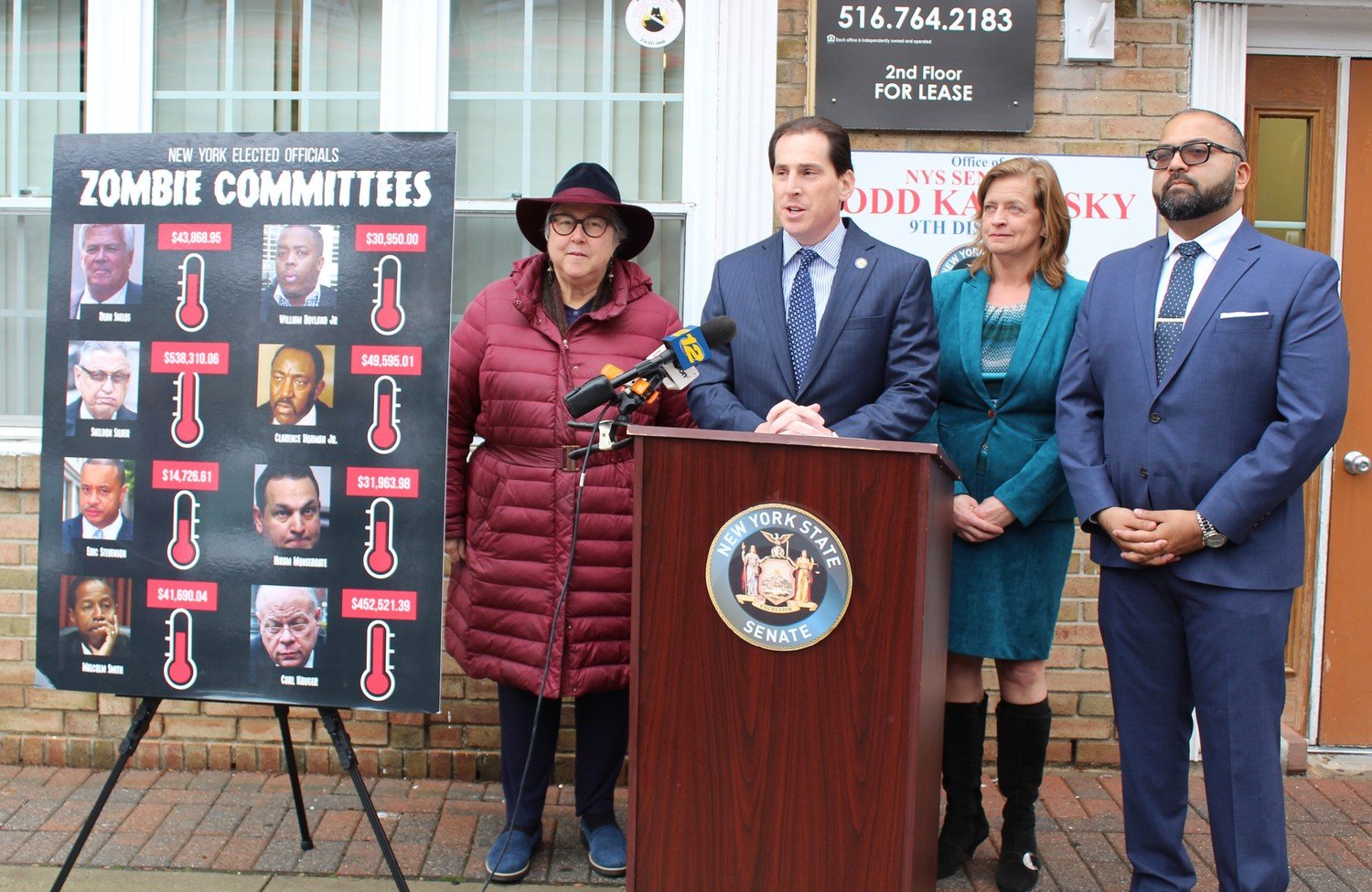 State Sen. Todd Kaminsky, at lectern, and Assemblywoman Judy Griffin, second from right, joined Senate and Assembly colleagues to support Gov. Kathy Hochul's mask mandate in schools despite Nassau County Executive Bruce Blakeman's recent executive order meant to fight those mandates.