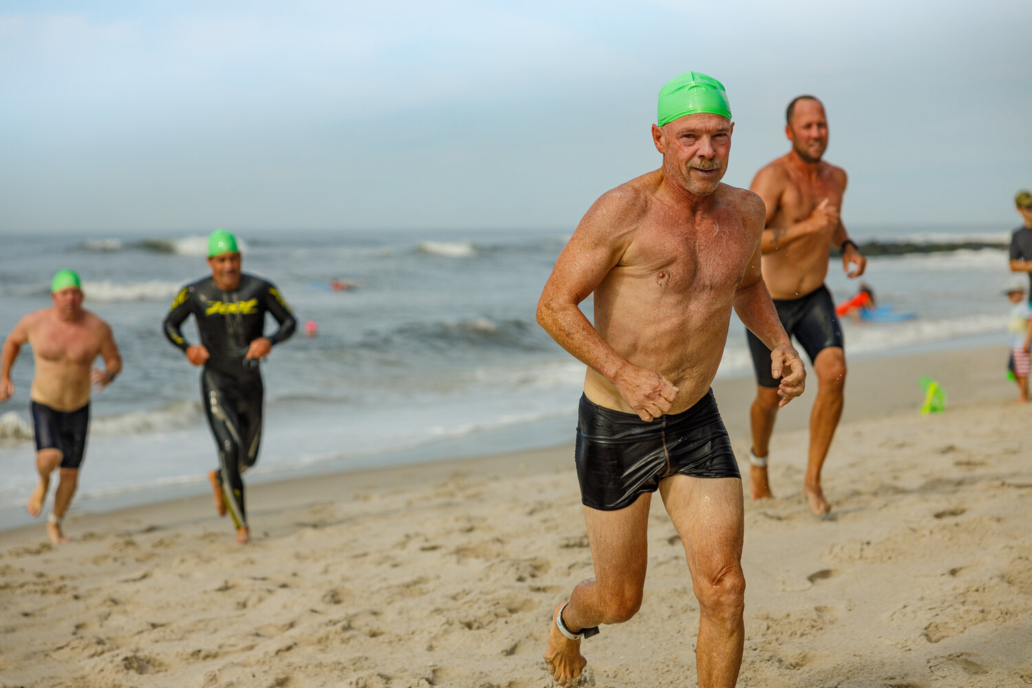 Swimming for our past Long Beach lifeguards | Herald Community ...