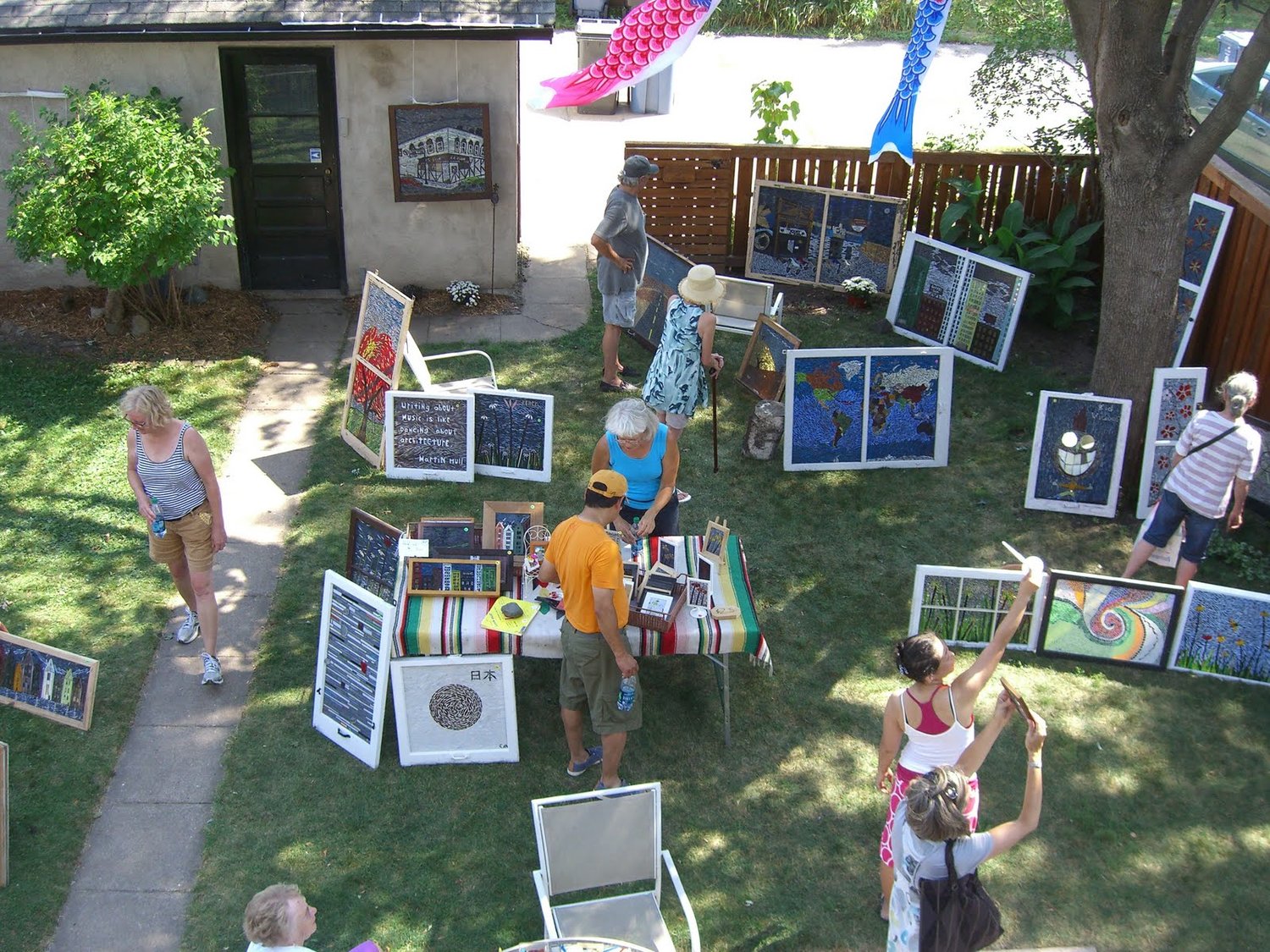 Visitors browse through Chris Miller’s backyard during a previous LoLa Art Crawl.