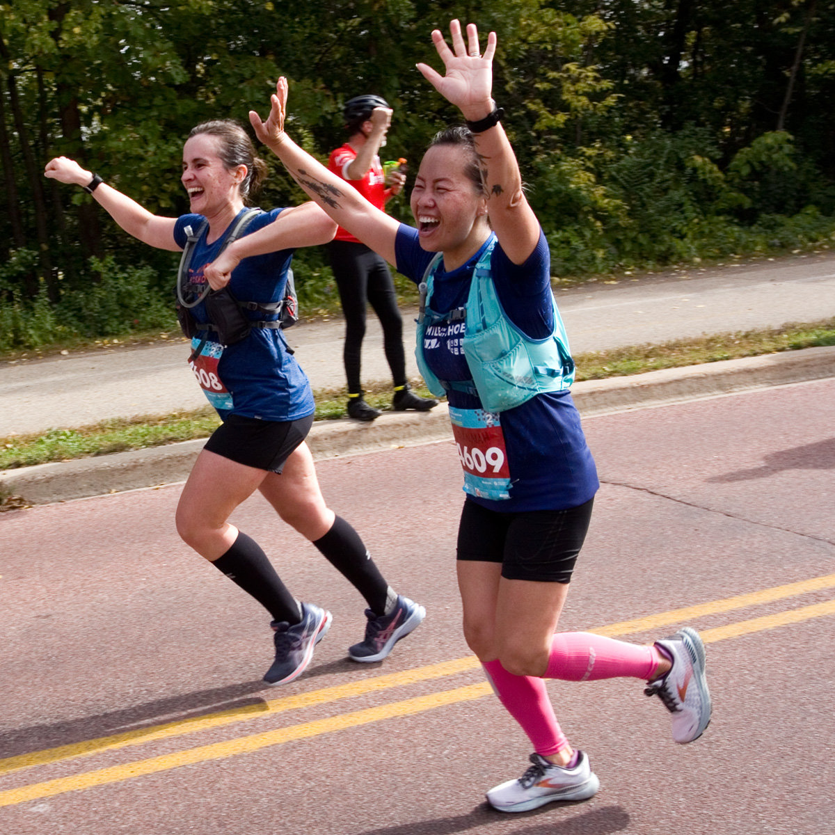 A pair of MiMS runners compete in the full 26.2-mile Twin Cities marathon on Oct. 3. (Photo by Margie O’Loughlin)