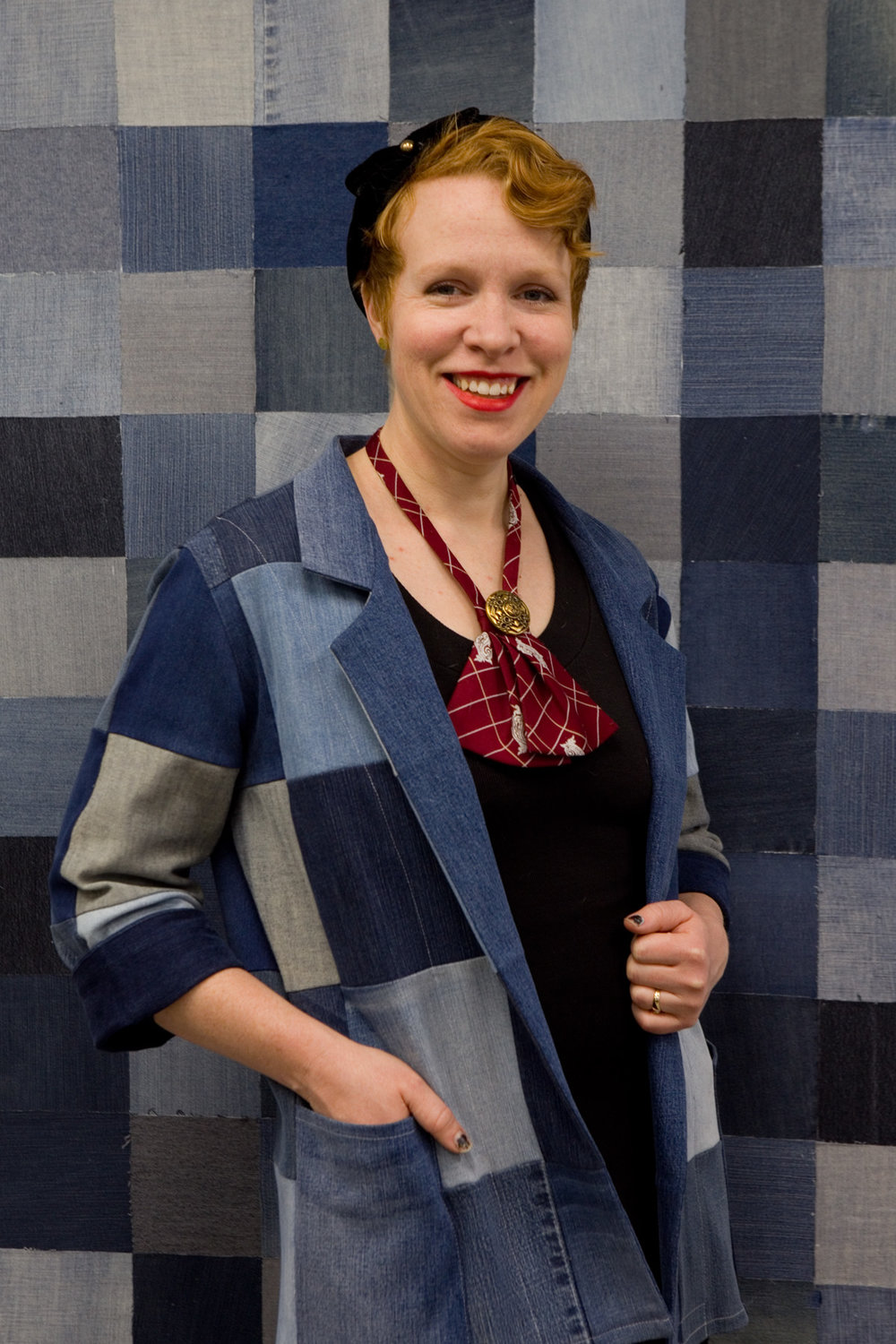 RETHINK owner Kristen McCoy in an upcycled denim blazer. She explained, “To upcycle is to add value to something in the processing. We’re able to take a worn garment and turn it into something new. We take jeans that are no longer wearable and cut them into denim squares. The result is a reversible blazer that still has a lot of wear. It’s on sale at the shop, and is size fluid (small to large).”  (Photos by Margie O’Loughlin)