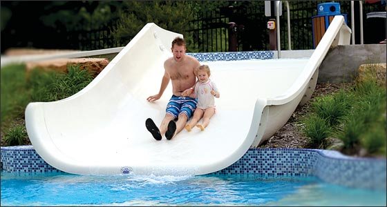 On the wide water slide, groups of up to four can slide down together. (Photo by Tesha M. Christensen)