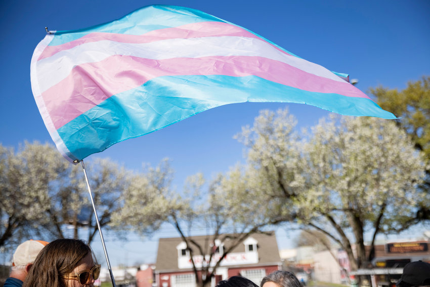 Protestors gather at the University of Texas Southwestern Medical Center following the shuttering of the Genecis program, which no longer provides gender-affirming medical care to transgender adolescent patients, on Thursday, March 31, 2022, in Dallas.  (Juan Figueroa/The Dallas Morning News/TNS)