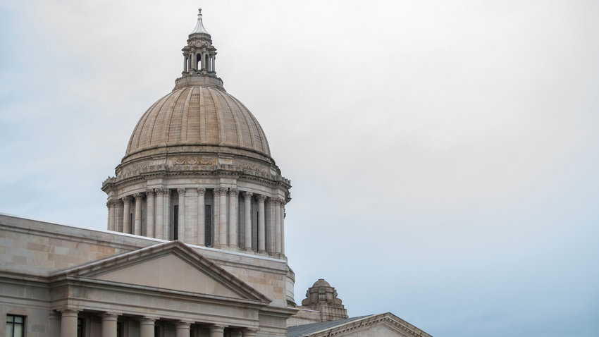 The Washington state Capitol building stands against clear skies in Olympia.