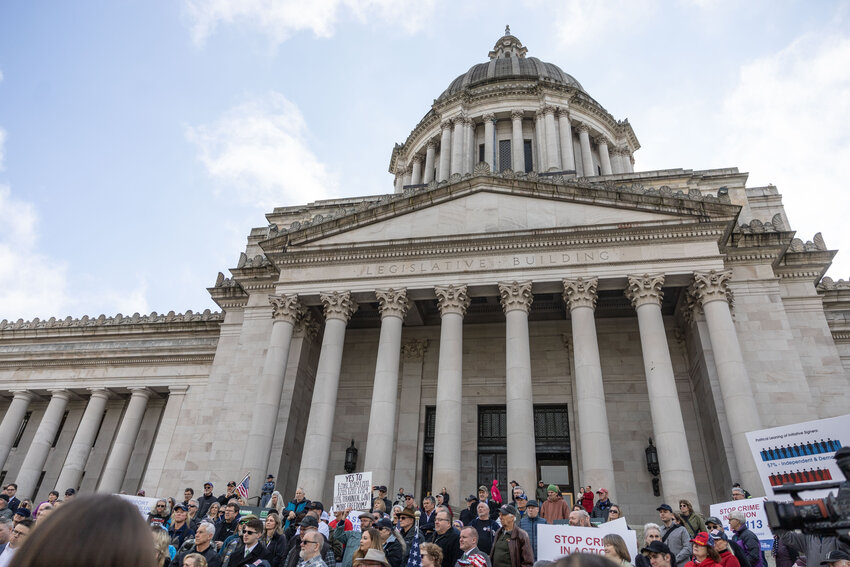 People gather at the Capitol during the &ldquo;Let&rsquo;s Go Washington&rdquo; initiatives rally in Olympia on Friday, Feb. 23, 2024.