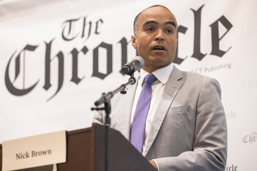 Former U.S. attorney for Western Washington and current state Attorney General Nick Brown answers a question during a debate between attorney general candidates hosted by The Chronicle in the TransAlta Commons at Centralia College on Thursday, Sept. 26.