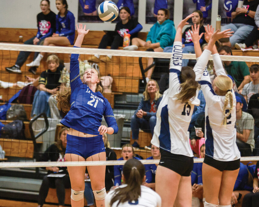La Center&rsquo;s Billie Ross floats a hit over a Seton Catholic Cougar block attempt during the La Center Wildcats&rsquo; 3-0 win on Thursday, Oct. 3. The Wildcats remained undefeated in the 1A Trico League as of Thursday.