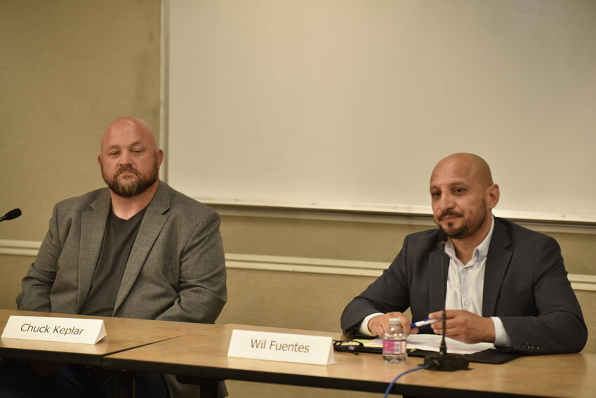 Clark County Council District 3 candidates Chuck Keplar (left) and Wil Fuentes shared their views on the county's use of the Chelatchie Prairie Railroad and the impact of state noncompliance, which resulted in the loss of $6.4 million in state funds.