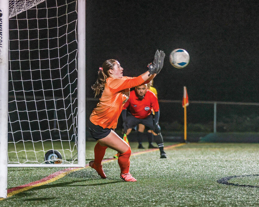 Ridgefield&rsquo;s Tyler Merlock blocks the ball to secure the game-winning save in a 5-4 penalty kicks thriller for the Spudders&rsquo; big 2A Greater St. Helens League win over the Columbia River Rapids on Tuesday, Oct. 22.