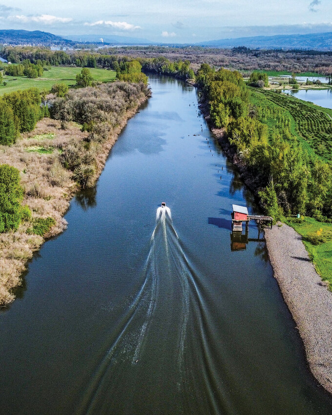 Local waterways, including Lake River, are impacted by harmful algae blooms in Vancouver Lake during hot summer months. The county is reviewing long-term solutions such as expanding the flushing channel and using algaecide treatments to improve water quality and protect public health.