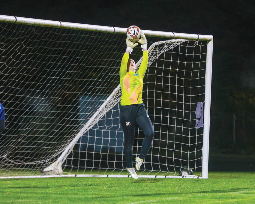 Hockinson&rsquo;s Audrey Armstrong leaps to make a save during a back-and-forth matchup against the Woodland Beavers during the 2A District 4 girls soccer tournament on Wednesday, Nov. 6. The Hawks won, 4-3.