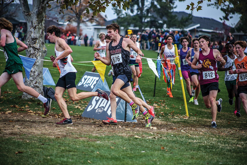 Prairie's Dekota Houfek chugs along at the state championship meet at Sun Willows Golf Course in Pasco on Nov. 9.