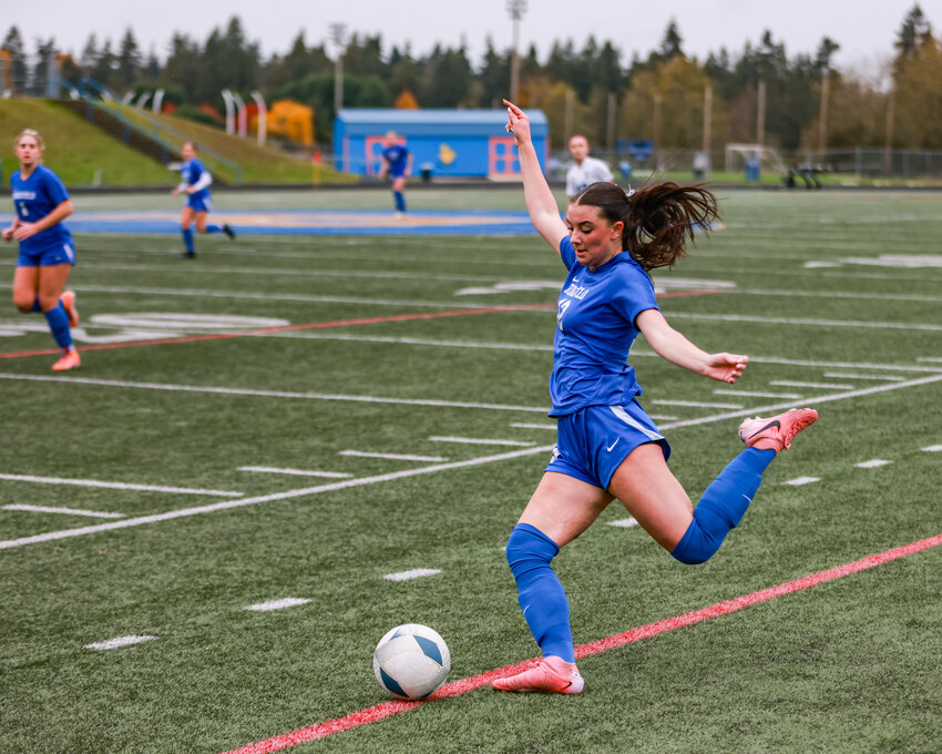 Ridgefield&rsquo;s Marlee Buffham sends a cross in the quarterfinal round against Fife High School on Nov. 16. Buffham scored the state title&rsquo;s lone goal after it deflected off of a Columbia River player and into the back of the net as the Spudders won back-to-back 2A state championships with a 1-0 win over the Columbia River Rapids on Saturday, Nov. 23.