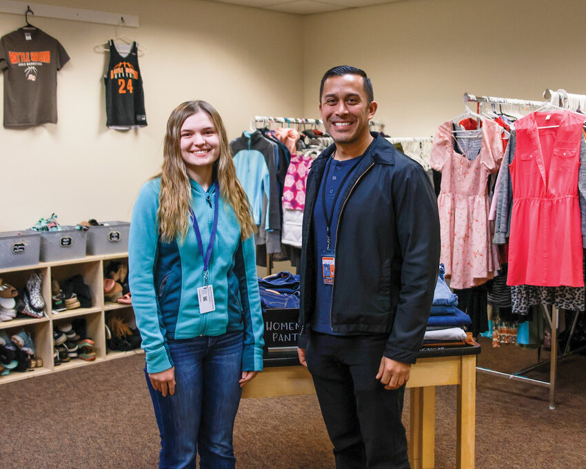 Abby Hertner, left, a 2023 Battle Ground High School graduate, helped Nick Santilli, Battle Ground High School counselor, in a big way by donating an estimated 500 items from the Vancouver Mall Maurices store, where Hertner is an assistant manager, to the Battle Ground High School thrift store that Santilli helped create with other students and staff.