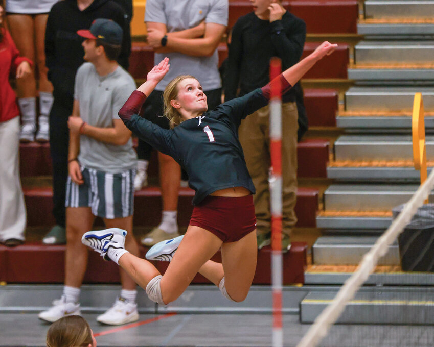 Prairie&rsquo;s Alivia Snyder leaps to spike the ball in the Falcons&rsquo; 3-1 loss to the Camas Papermakers in October. Snyder was named to the first team all-league 3A Greater St. Helens League volleyball roster.