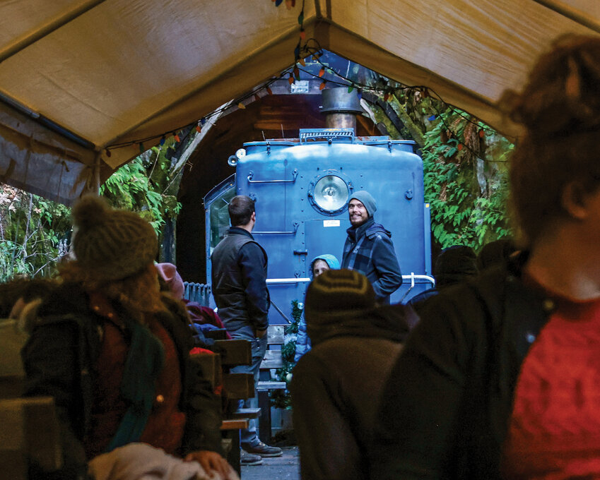 The Chelatchie Prairie Railroad Christmas Train comes out of the 300-foot long tunnel last year.