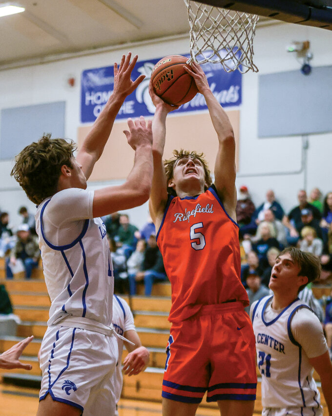Ridgefield&rsquo;s Jamison McCann goes for a contested layup en route to his 30 points in the Spudders&rsquo; 64-62 victory over the La Center Wildcats on Wednesday, Dec. 4.