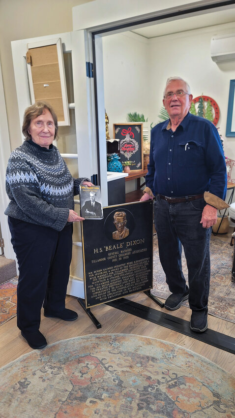 Tim Dixon, right, and his sister, Barbara Dobrinen, collaborated to tell the story of their father in &ldquo;Calm Amidst Crisis, The Life of Hubert Scripps &lsquo;Beale&rsquo; Dixon.&rdquo; They celebrated with a book-signing event at Founder&rsquo;s Coffee and Mercantile in Battle Ground on Saturday, Dec. 14, just a half block away from where Hubert Dixon grew up.