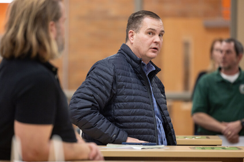 Sen. John Braun speaks during a town hall meeting in the Centralia High School library on Thursday, Dec. 19.