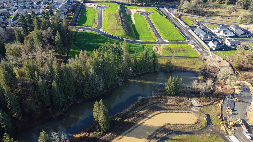 The Allen Canyon Creek watershed rests in the heart of Paradise Pointe, a 291-home neighborhood in development in Ridgefield. During a Thursday, Dec. 19, meeting, the Ridgefield City Council approved a master plan outlining a future 15-acre park including play structures, trails, wildlife observation areas and a pedestrian bridge over the creek.