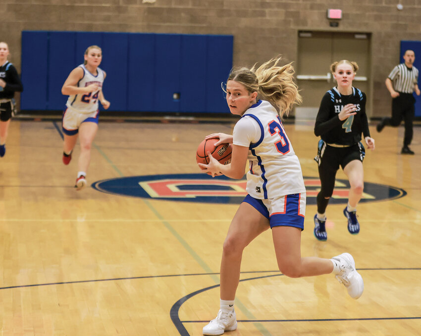 Ridgefield&rsquo;s Madison Ingham catches a breakaway pass for a layup during her 30-point effort in the Spudders&rsquo; 65-28 win over the Hockinson Hawks on Friday, Dec. 20.