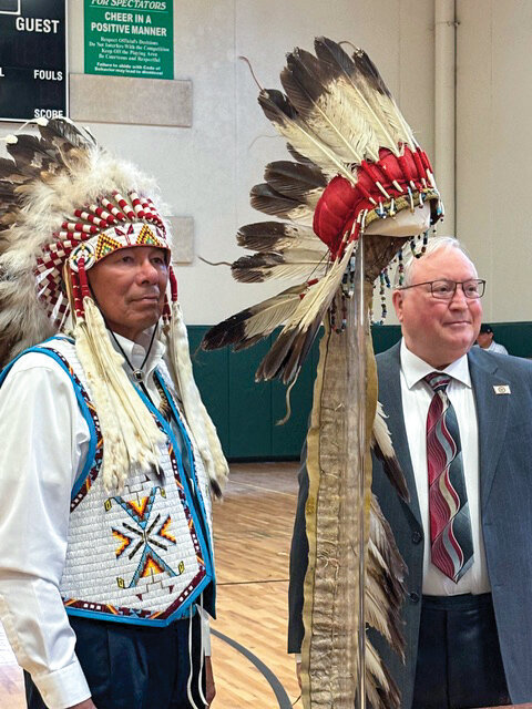 La Center resident James Newell, right, decided to return his family heirloom to John Spotted Tail, the descendant of the original owner, left, in 2020. In May of this year, an official transfer ceremony was held in Pierre, South Dakota, as the Native American suit worn by Lakota Chief Spotted Tail in the 1800s was given to the South Dakota State Historical Society for display.