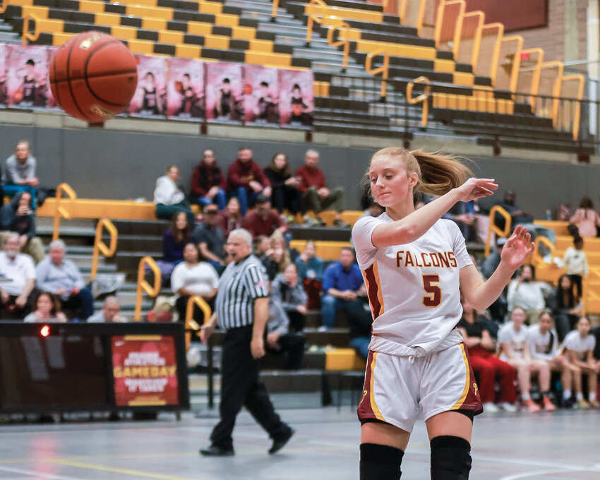 Prairie&rsquo;s Emma Smith passes the ball during the Falcons&rsquo; 71-7 win over Hudson&rsquo;s Bay High School on Friday, Jan. 3.