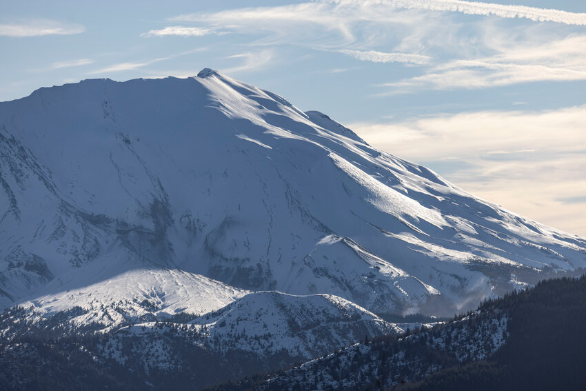 The sun shines on the western side Mount St. Helens on Thursday, Jan. 23, 2025.