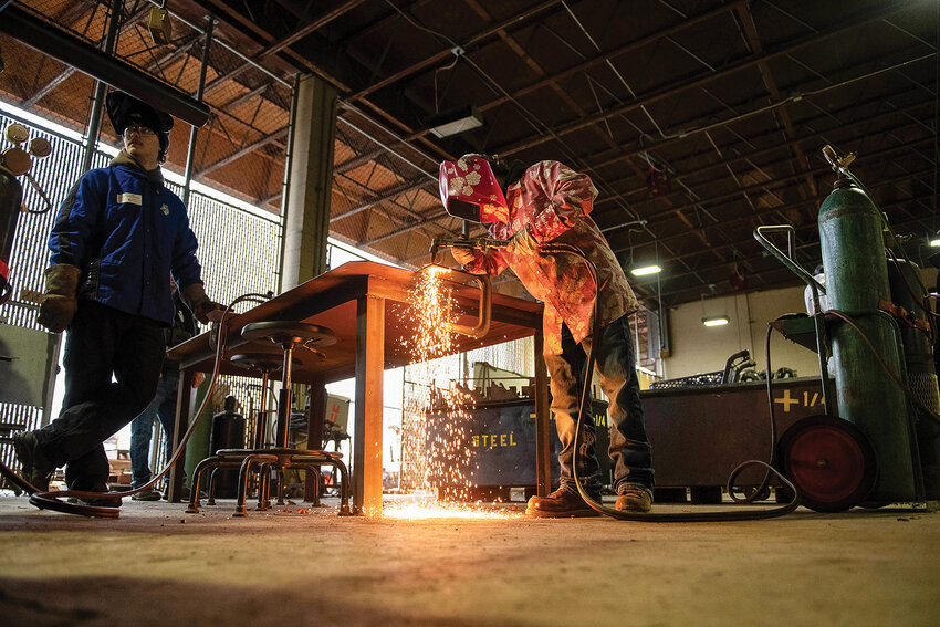 A Prairie High School student welds while competing in a SkillsUSA regional team fabrication competition at Centralia College on Friday, Jan. 31.