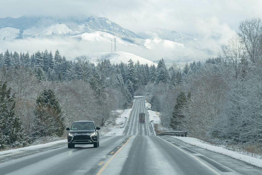 Trees and surrounding hills are covered in snow along U.S. Highway 12 outside of Morton on Monday, Feb. 3. 2024.