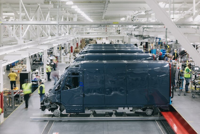 Employees work at a Rivian electric vehicle factory in Normal, Ill., in 2021. (Courtesy of Rivian)