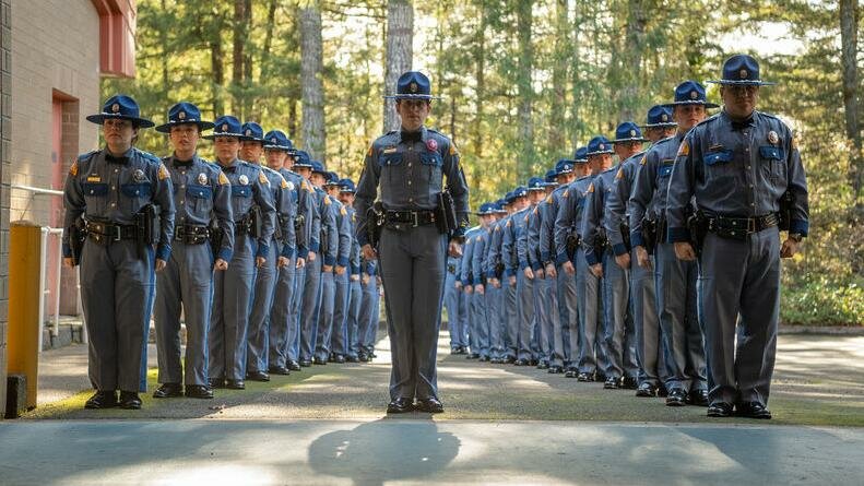 The Washington State Patrol's 119th Trooper Basic Training Class stands during an open house on Oct. 29, 2024. The WSP's net nanny operations have resulted in the arrests of over 300 alleged child predators since 2015.