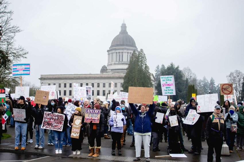 A protest in Olympia on Feb. 5, 2025 was part of a national movement to push back against President Donald Trump and his policies. (Photo by Jacquelyn Jimenez Romero/Washington State Standard)