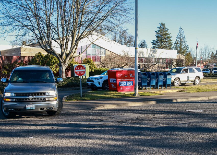 A consistent stream of voters dropped off their ballots at the Battle Ground drop box in the afternoon of Tuesday, Feb. 11.