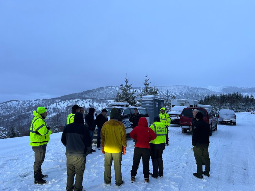 Emergency responders and search and rescue personnel gather near Coldwater Lake for a rescue operation on Feb. 7 in this photo provided by the Cowlitz County Sheriff&rsquo;s Office.