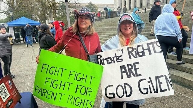 Two rally-goers in Olympia on Saturday.