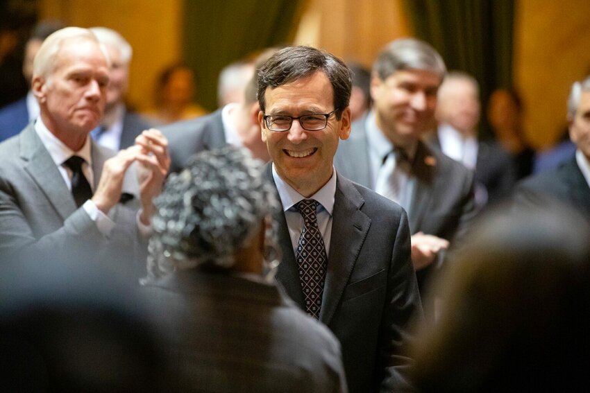 Gov. Bob Ferguson makes his way through the room prior to being sworn in on Wednesday, Jan. 15, 2025, at the Washington state Capitol in Olympia, Wash. (Photo by Ryan Berry/Washington State Standard)