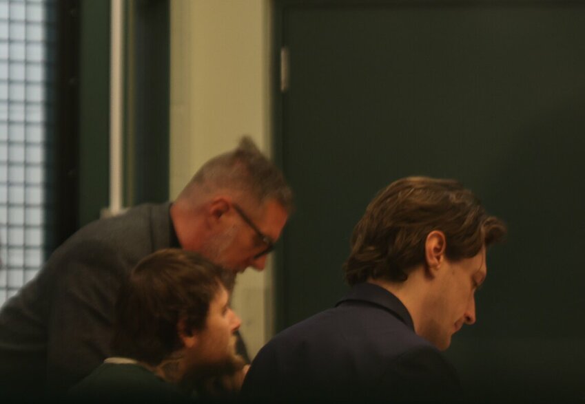 Makiah D. Voorhees sits between his attorneys, Stephen Geiger and Ted Debray, during his sentencing hearing on Tuesday, Feb. 4, in Kelso.