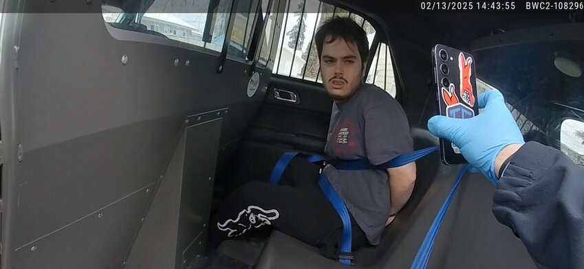 Baylee Sun Garcia, 20, of Longview, inside a patrol car after being arrested on Thursday, Feb. 13, in connection with the death of a teenager.