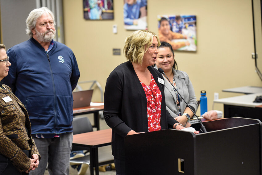 Battle Ground Education Foundation President Alison Bullock addresses the Battle Ground Public Schools Board on Monday, Feb. 10, detailing the impact a $25,000 grant from the now-closed Battle Ground Rose Float Committee Funds will provide. The money will help provide internet access for students facing financial hardship and support equipment maintenance for the Battle Ground High School Marching Band.
