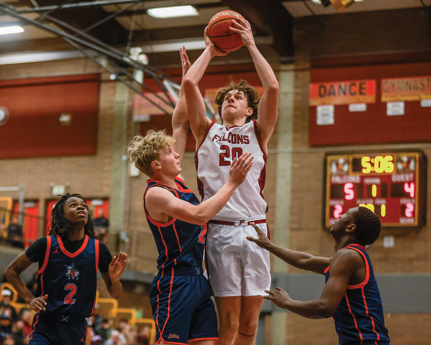 Prairie&rsquo;s Carson Morningstar makes a shot in the first half of the Falcons&rsquo; 66-61 win over Lakes High School in the opening round of the 3A District 3/4 tournament on Wednesday, Feb. 12.
