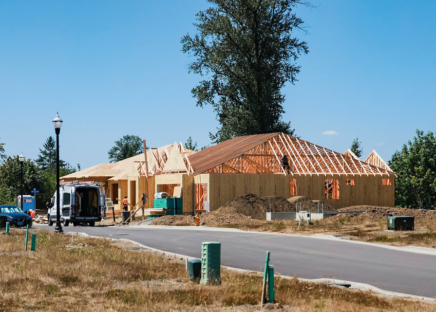 FILE PHOTO &mdash;&nbsp;New construction takes place in Battle Ground&rsquo;s River Bend development on the north side of Northwest 25th Street in August 2023.