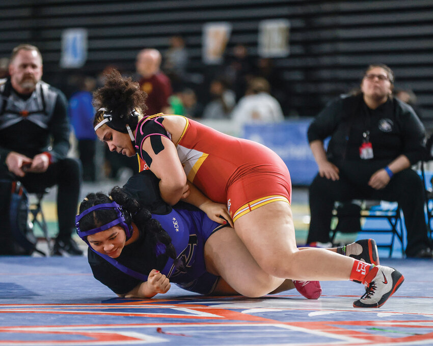 Prairie&rsquo;s Faith Tarrant became the first ever four-time state wrestling champion from Clark County on Friday, Feb. 21 with a first round pin over Olivia Hudson of Oak Harbor, for the girls 235-pounds crown in girls 3A wrestling.