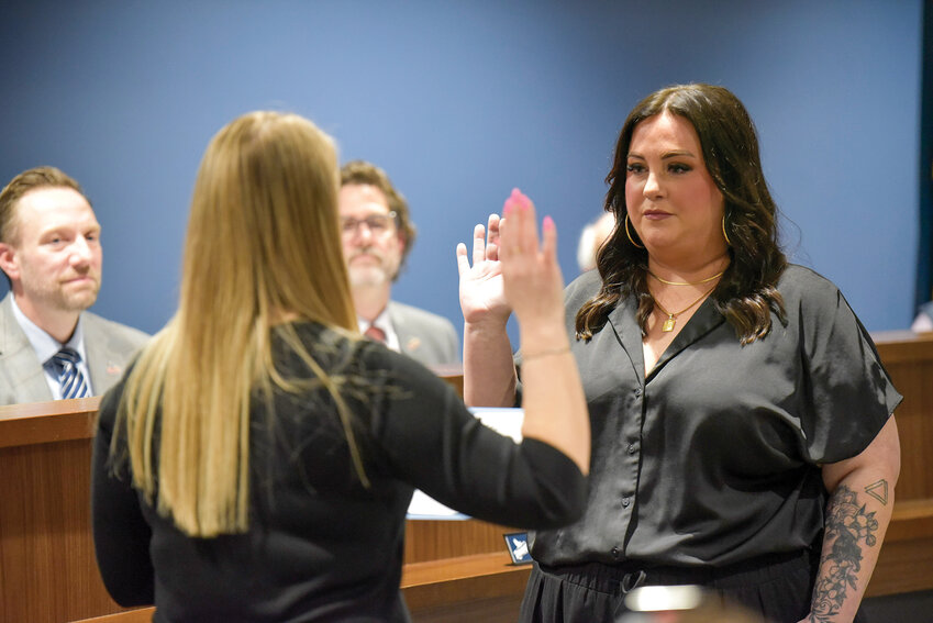 Meghan Hamilton takes the oath of office on Feb. 27. She was officially sworn in as the newest Ridgefield City Council member following a 25-minute deliberation process.