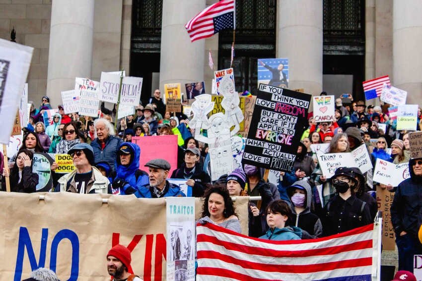 &ldquo;Stand up, fight back,&rdquo; the crowd chanted as they gathered to protest against the Trump administration. (Photo by Jacquelyn Jimenez Romero/Washington State Standard)